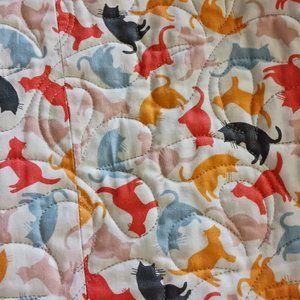 Quilt, measuring 60" by 44"